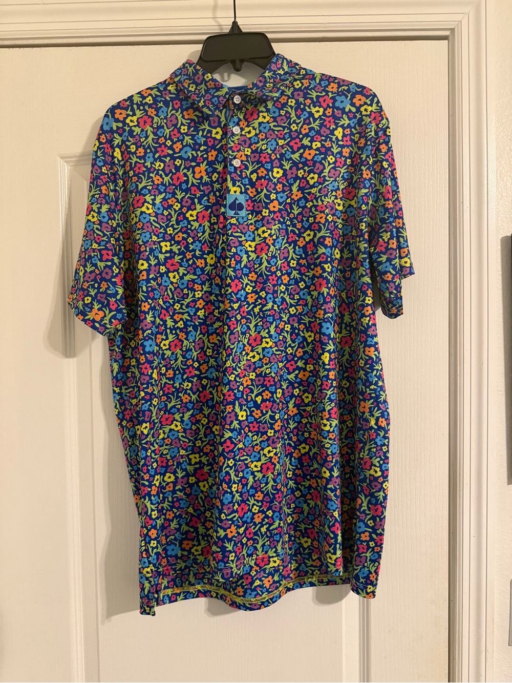 Pins & Aces floral golf polo